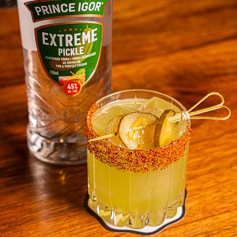 A spicy pickle margarita cocktail and a bottle of Prince Igor Extreme Pickle Flavoured Vodka